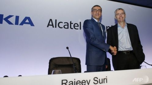 Rajeev Suri con Alcatel Lucent
